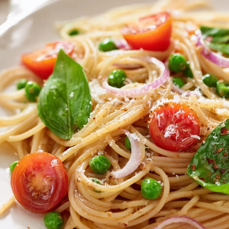 Vibrant Spring Veggie One-Pot Spaghetti served hot in a rustic bowl, ready for a simple weeknight dinner.